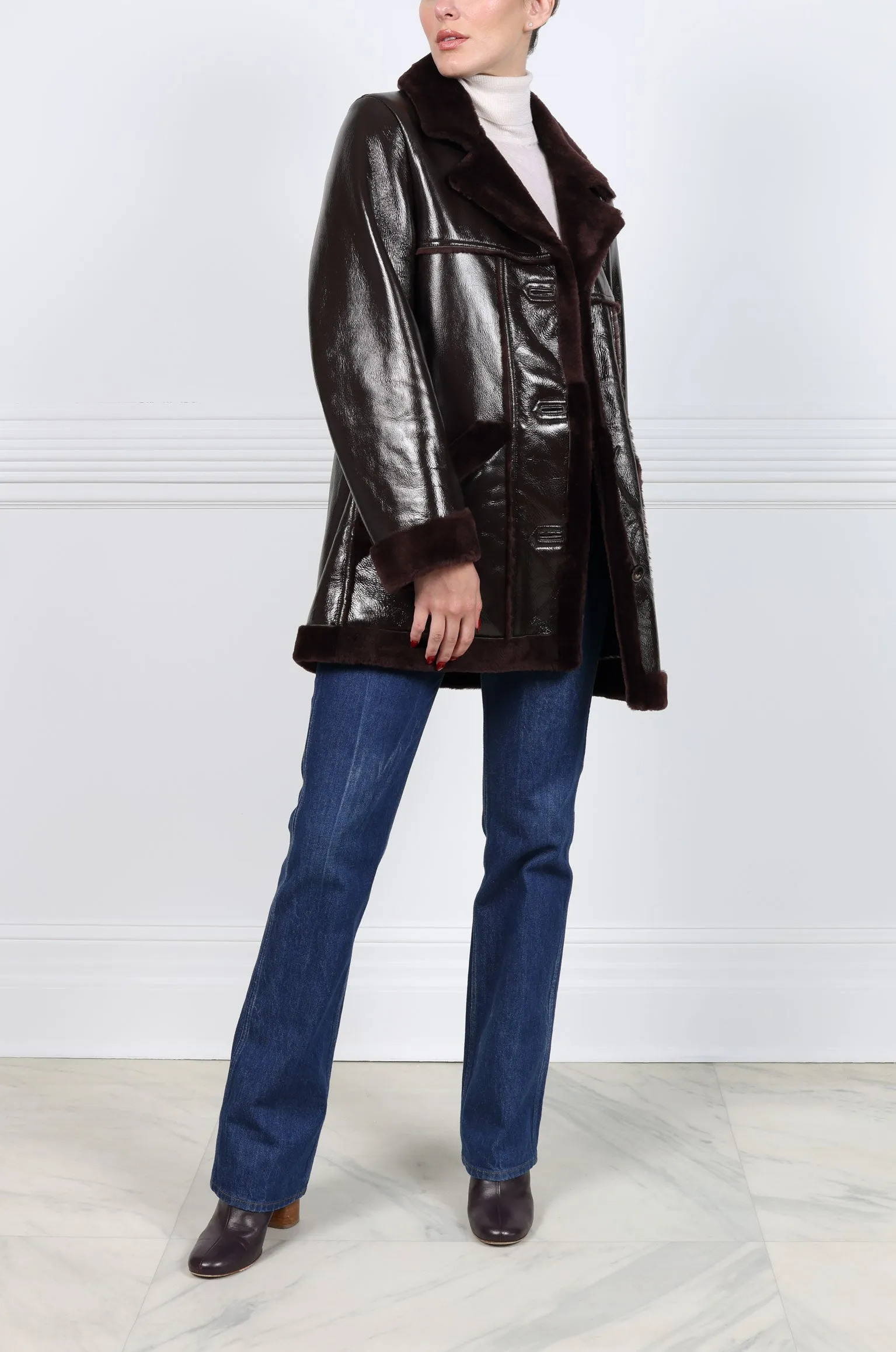 The Vermilion Patent Shearling Coat